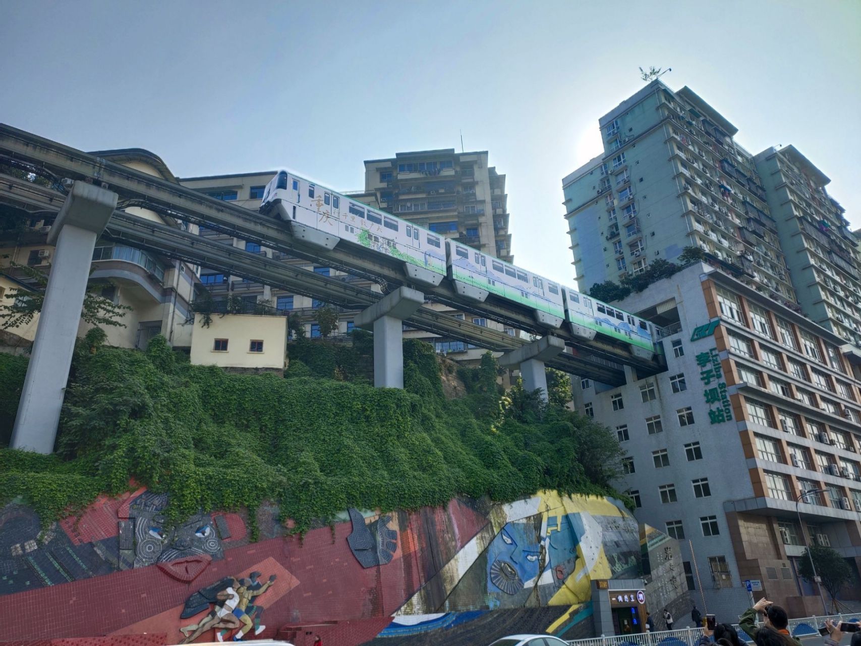 Liziba Monorail Passing Through the Building.webp